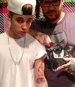 Justin Bieber and his new Eyeball tattoo with Bang Bang