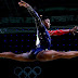 Olympics announcer tweets gymnast's adoptive parents aren't her parents