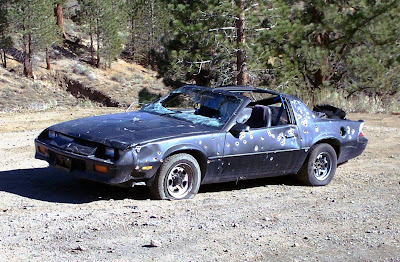 Car riddled with bullet holes