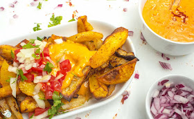 creamy Chili Cheese Sauce with baked fries
