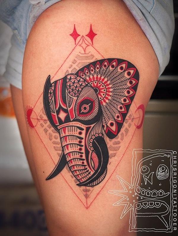 Este hyper-estilizado tatuagem mostra um elefante adornada com uma intrigante preto e vermelho padrão que chama a atenção para a peça.