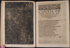 An open book, the left side entirely dark and the right printed with text.
