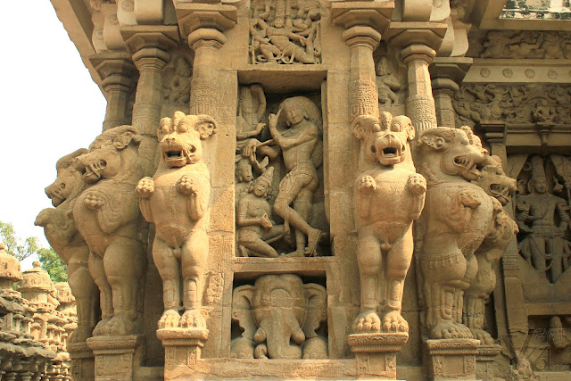 Typical design of pillar with multi-directional mythical lions with panel of Shiva at the center