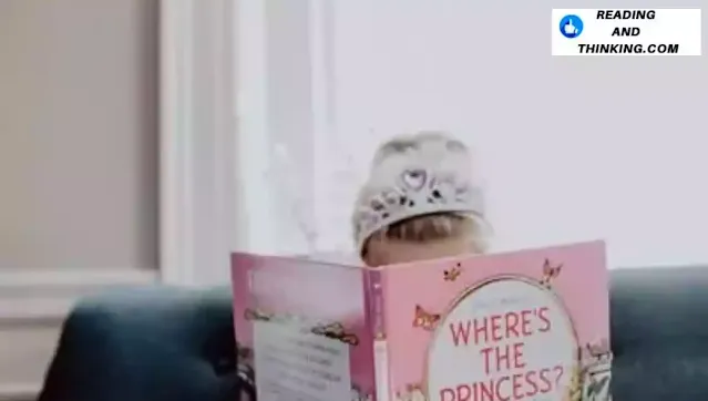 A young child wearing a crown reads a children's book titled "Where's the Princess?" while seated on a sofa.