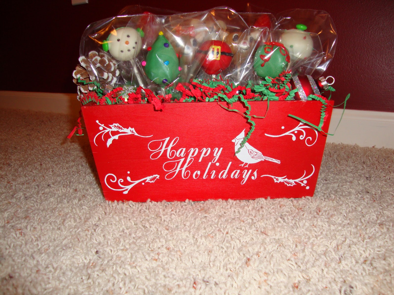 christmas ornament cake pops  was making cake pops a whole bunch of cake pops together in a basket