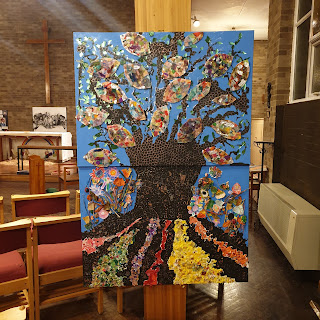 A tree with colourful roots and leaves made by children from St Paul’s CofE School in Friern Barnet and hung in St Andrew's Church, Wickford.