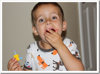 nate eating strawberry (1 of 1)