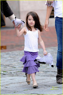 Suri Cruise in white shirt