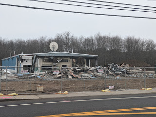 On Sunday's walk, the auto dealer building is half gone