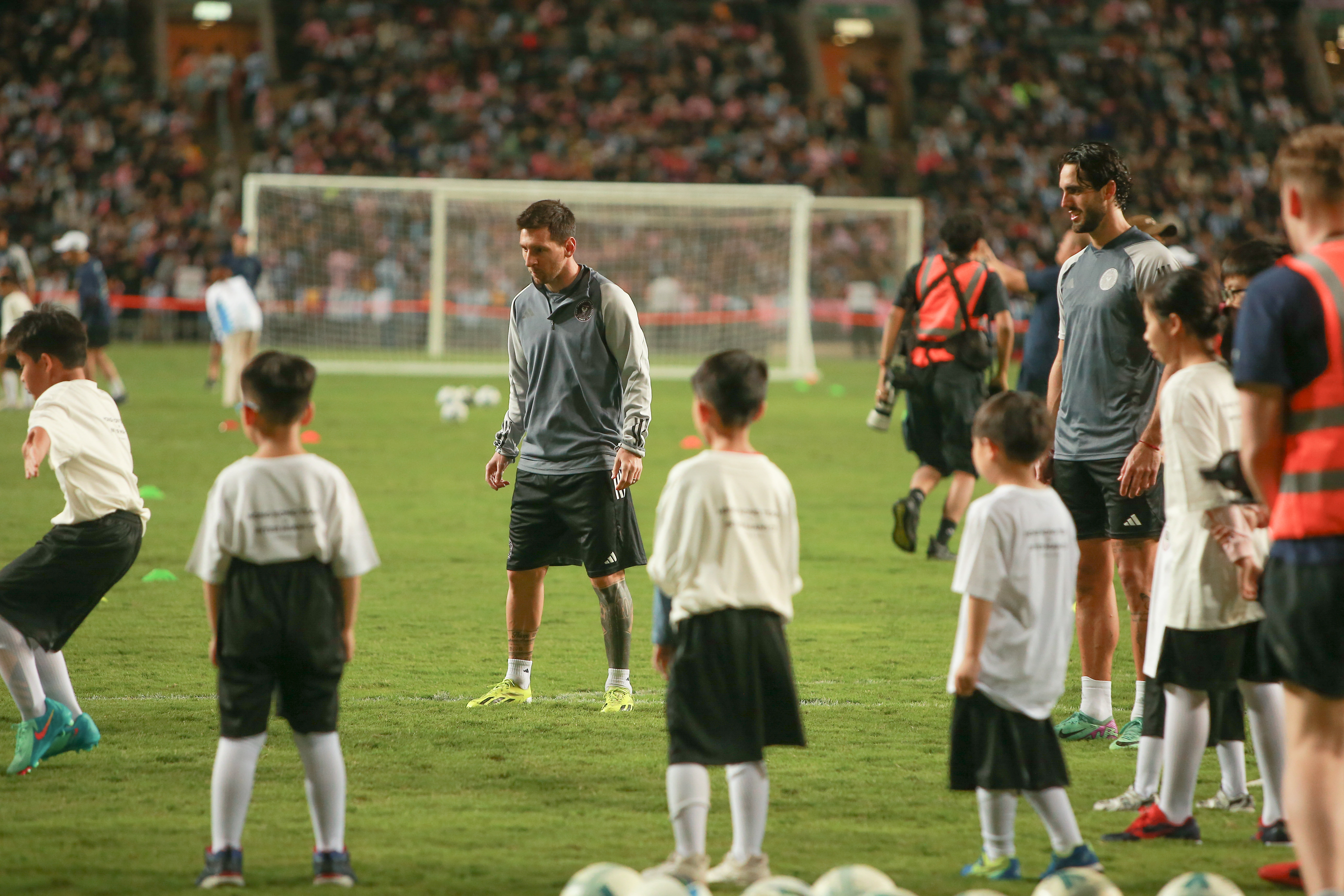 Messi with Hong Kong kids.