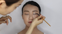 Modern Oriental Bridal Makeup - Follow by color 3 on outer corner of the eyes