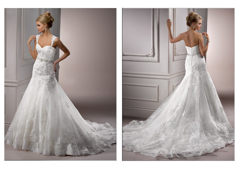 This tulle sweetheart neckline trumpet wedding dress has the feature of cap