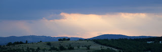 Distant rays of light through the clouds