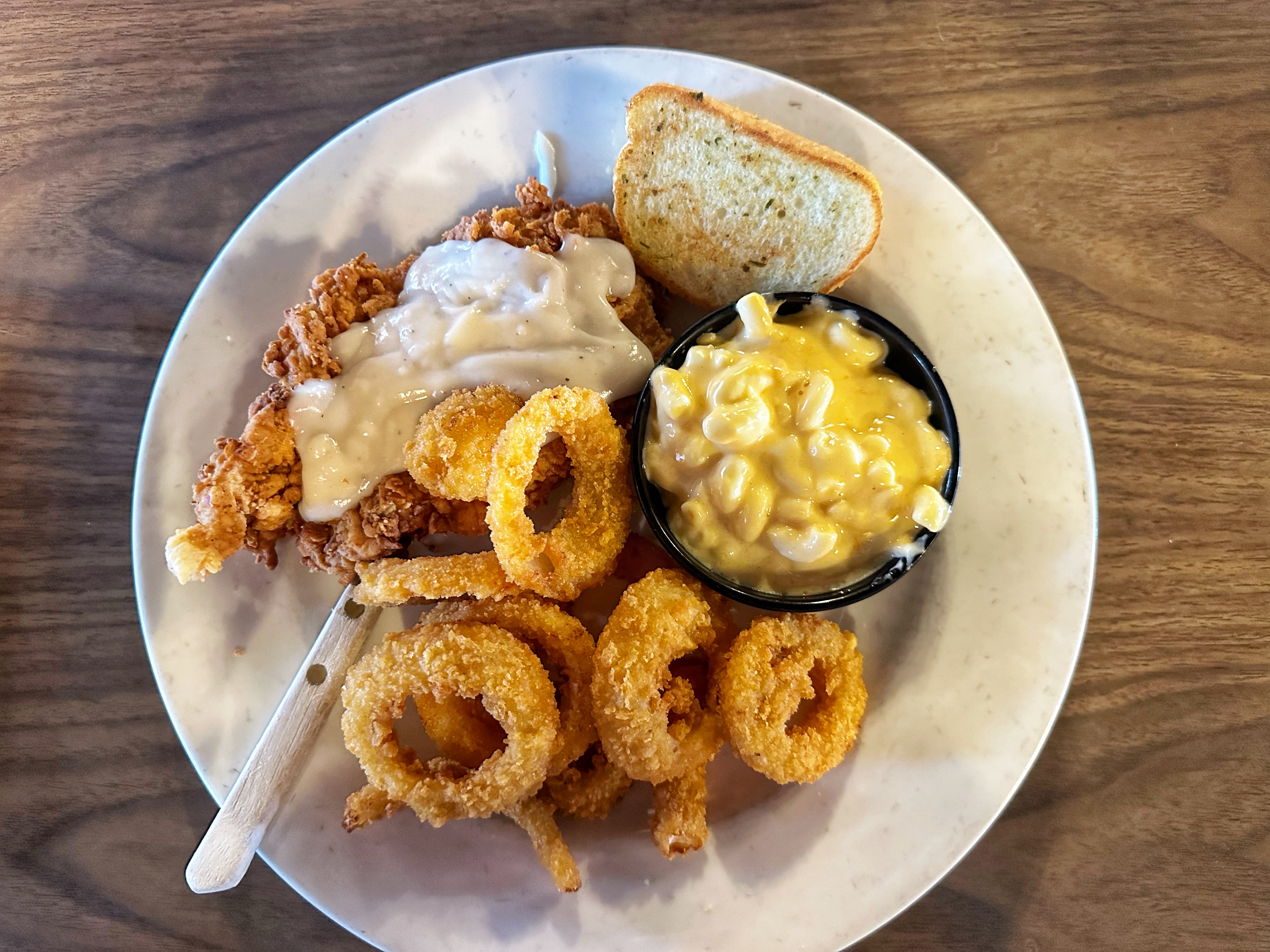 chicken fried chicken, onion rings, mac & cheese, and garlic bread at Horseshoe Grill, Eureka Springs, AR
