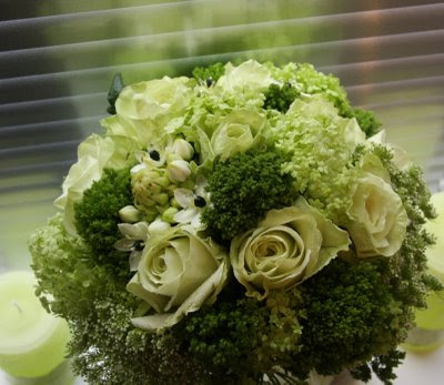 A lovely wedding Bouquet has a mixture of green flowers and green folige