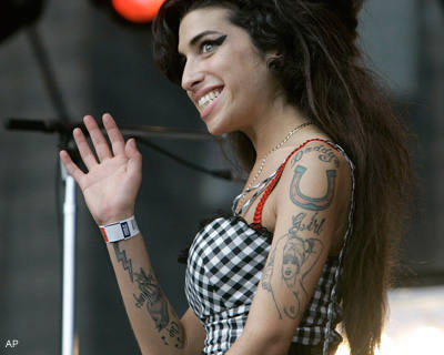 amy winehouse arm tattoos