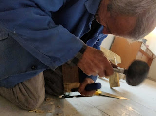 Trimming the bottom to fit over the tile edging