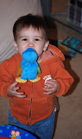 Tyler playing with the duckie