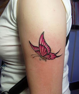 TATUAJE DE MARIPOSA EN EL BRAZO