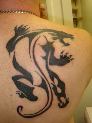 black panther tribal on back. at 7:46 PM