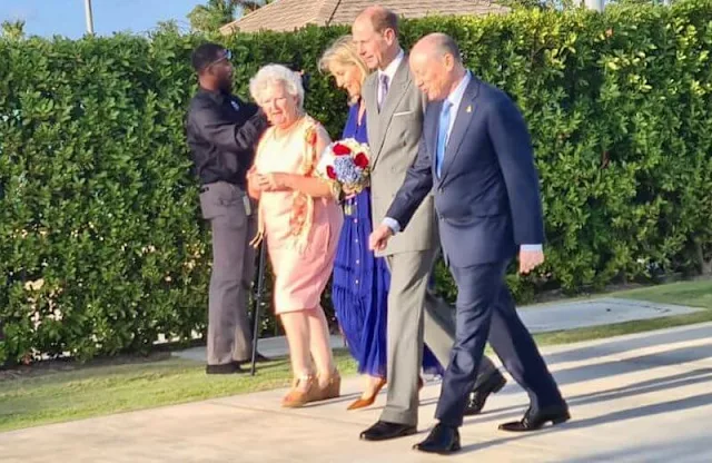 The Countess of Wessex wore a new Sheer crinkle silk-blend blue maxi dress by Me+Em. Isabel Marant Oskan Moon bag