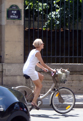 elegant cyclist on a Velib