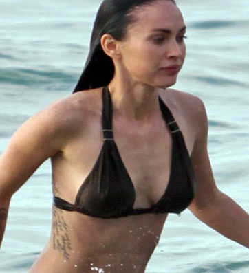 megan fox tattoos what do they say. tattoos of marilyn monroe