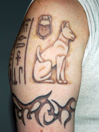 Egyptian cat tattoo on a big step to show your individuality, 