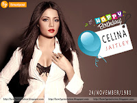 too much hot image of celina jaitly in white top, black bra, slightly peeping navel