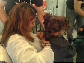Mum and toddler having first haircut 