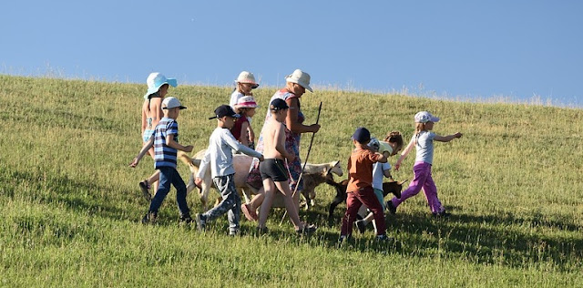 Image: Grandma walking with children, by Сергей Корчанов on Pixabay