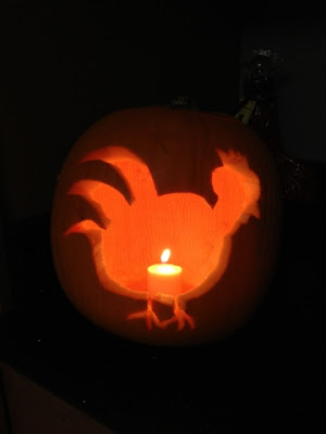 Chicken carved into a pumpkin
