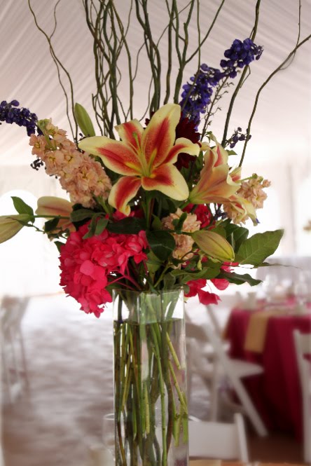 The tall centerpiece were made up of Shocking Oriental lilies hot pink 