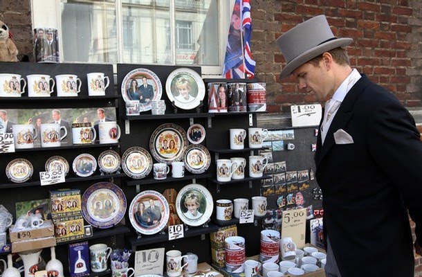 william and kate royal wedding memorabilia. Guest on his way to a wedding stops and buys souvenirs from a stall selling memorabilia for the royal wedding of Britain#39;s Prince William and Kate