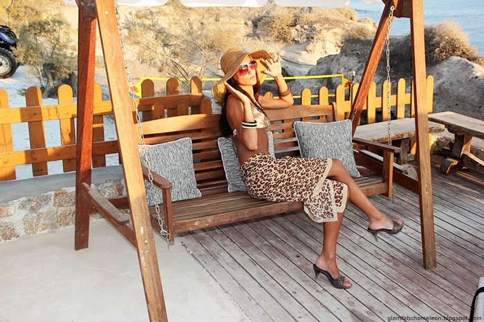 leopard print styled bikini look with hat scarf and mules