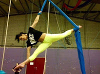 Louise doing splits at circus training on silks