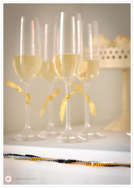 New Year's Eve party gold and black sparkling champagne glasses from BistrotChic