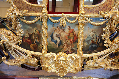 Panel detail on Gold State Coach at the Royal Mews, Buckingham Palace