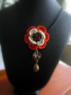 https://www.etsy.com/listing/236866713/crochet-flower-necklace-orange-beige-and?ref=shop_home_feat_1