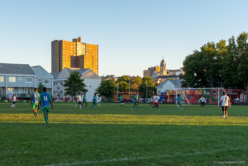 September 2015 Portland, Maine USA photo by Corey Templeton. A late afternoon soccer/football game at the Fox Street Field in East Bayside.