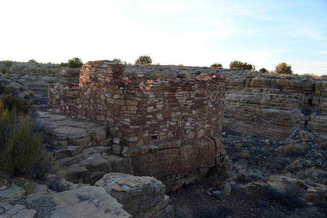 ruin beside a crack in the earth