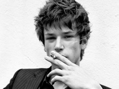 Gaspard's signature pose always includes a cigarettewhich just makes him