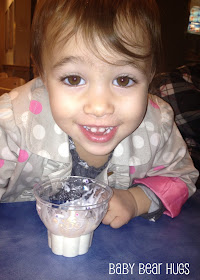 toddler girl eating ice cream