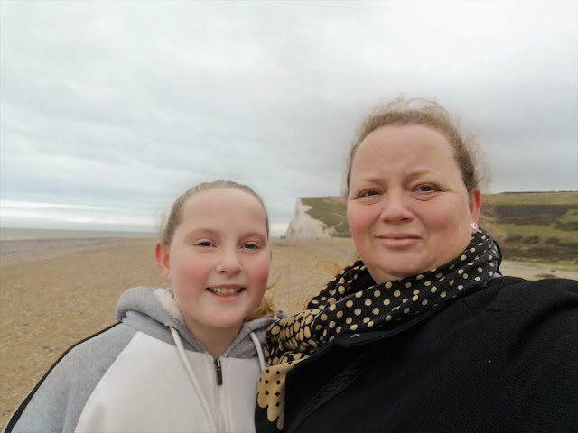 mother and tween daughter by the cliffs