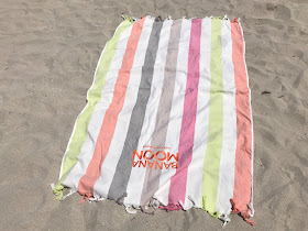 banana moon beach towel on the beach 