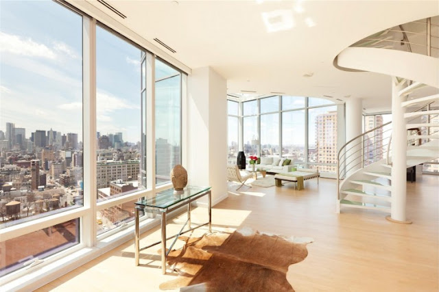 Photo of living room and staircase in one of the most beautiful penthouses