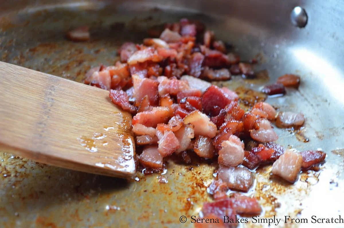 Crispy Bacon Crumbles in a stainless steel skillet.