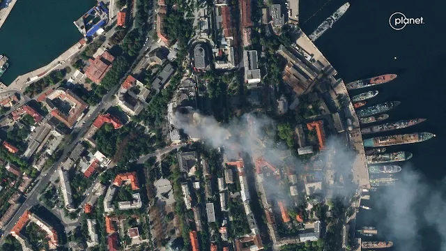 Cover Image Attribute: A satellite image shows smoke billowing from a Russian Black Sea Navy HQ after a missile strike in Sevastopol, Crimea, on September 22. / Source: Planet Labs PBC/Handout