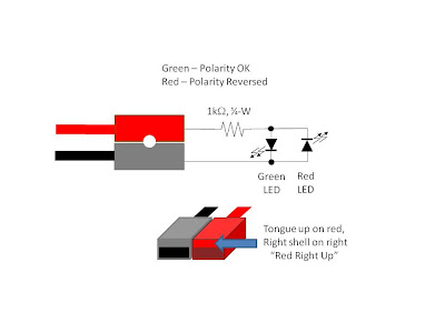 Schematic of a polarity checker with a 1k Ohm resistor and two LED's one red and one green