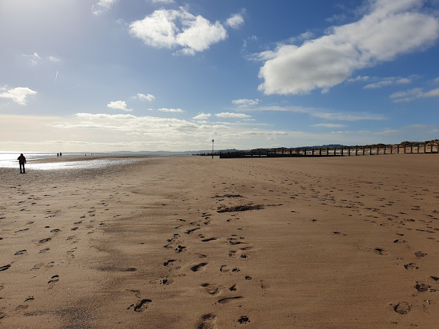 Footsteps in the sand on Dawlish Warren beach